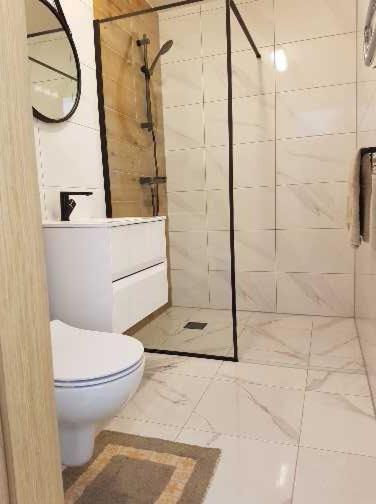 Dianos Apartamentai พาลังกา ภายนอก รูปภาพ